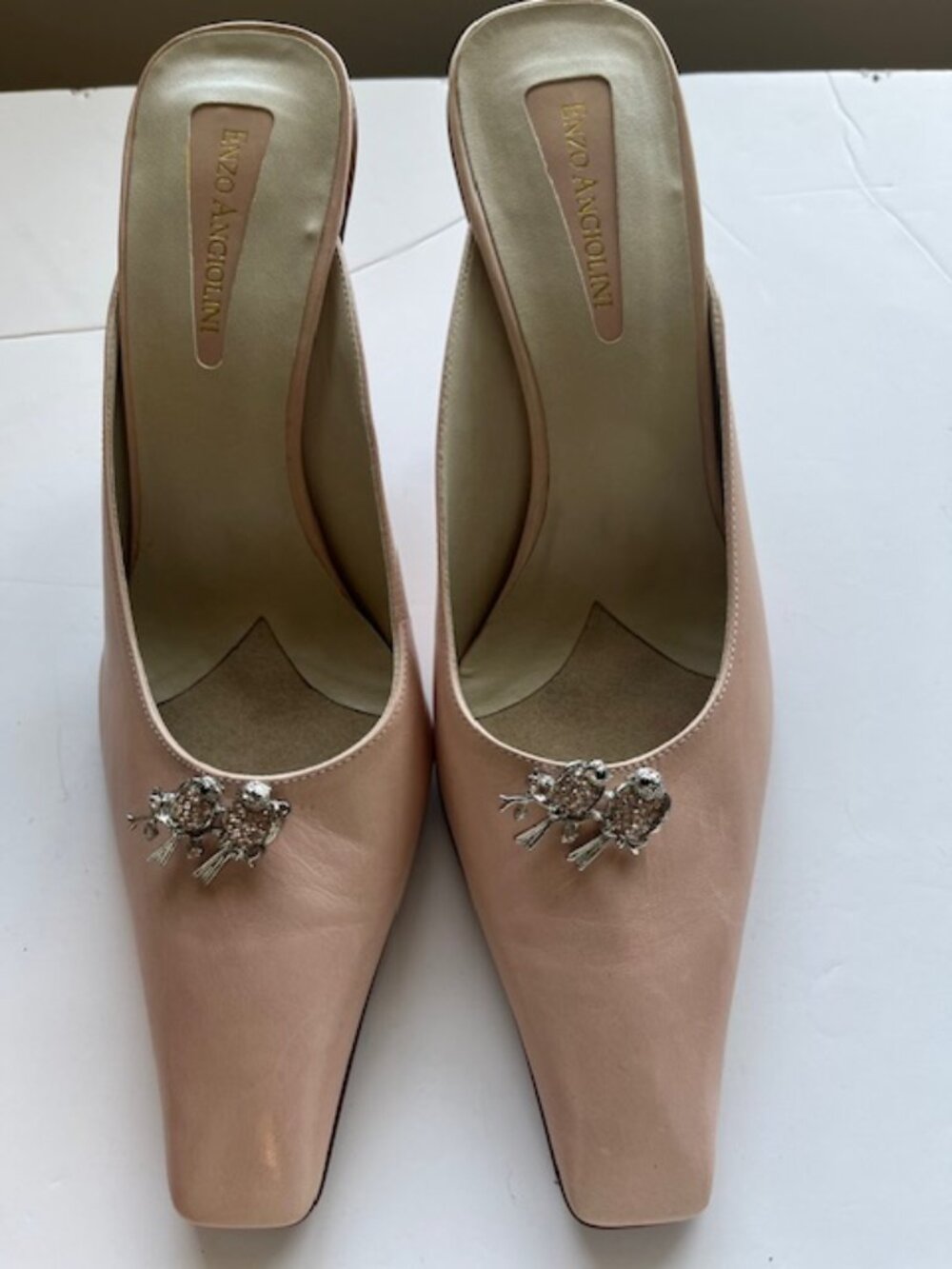 Enzo Angiolini pink leather mules.
